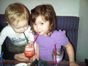 Our grandchildren enjoying a fresh strawberry margarita!